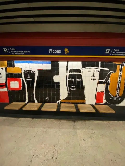 Face murals in Lisbon's Picoas Metro station