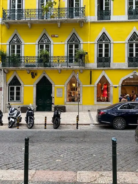 A bright, yellow mansion on Lisbon's trendy Avenida da Liberdade