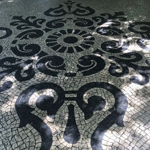 Black and white cobblestone mosaic on Avenida da Liberdade, Lisbon