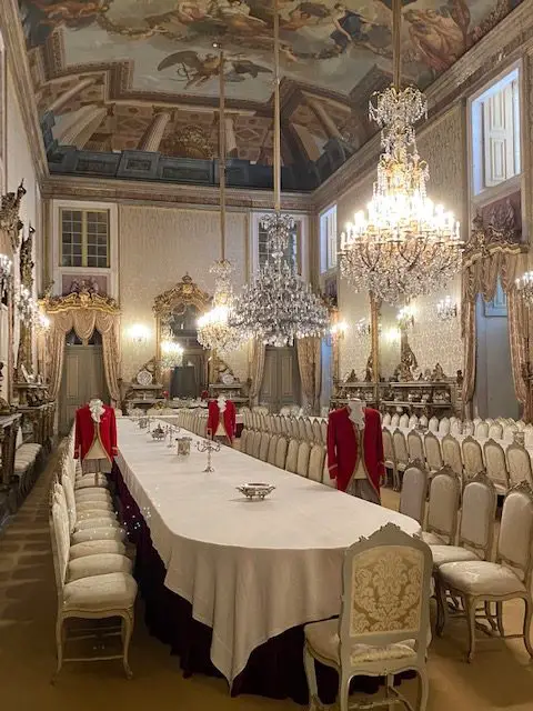 The white dining room of the Ajuda National Palace in Lisbon, Portugal