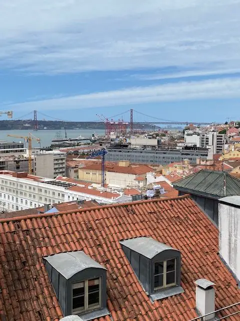 25 of April Bridge seen from the Miradouro de Santa Catarina viewpoint in Lisbon, Portugal