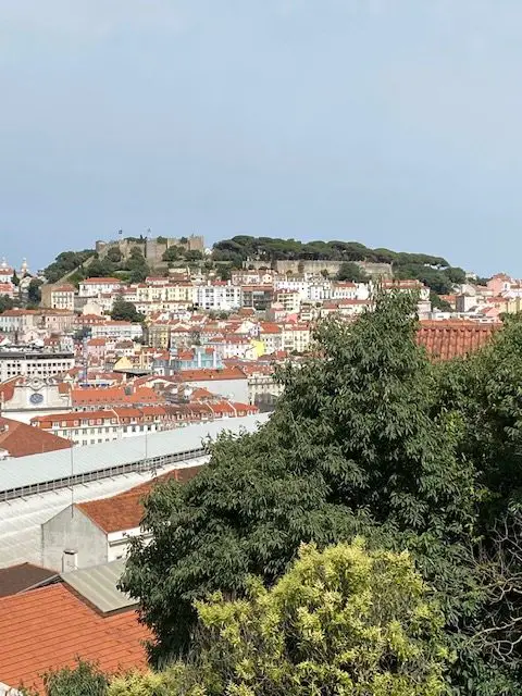 View of the Castelo de Sao Jorge from Lisbon's Miradouro de Sao Pedro de Alcantara scenic viewpoint