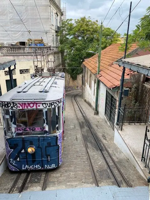 The Elevador do Lavra funicular carries passengers up the hill from Baixa to Jardim do Torel