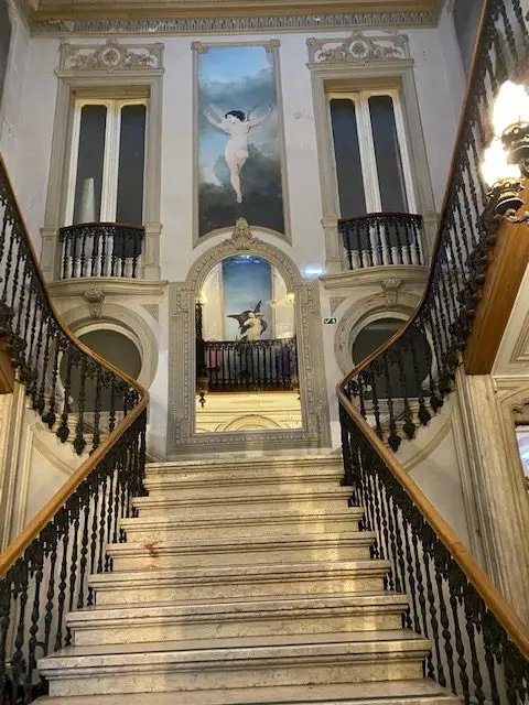 Angel frescos in the marble staircase landing of Lisbon's Embaixada Shopping Gallery, formerly the Ribeiro da Cunha Palace