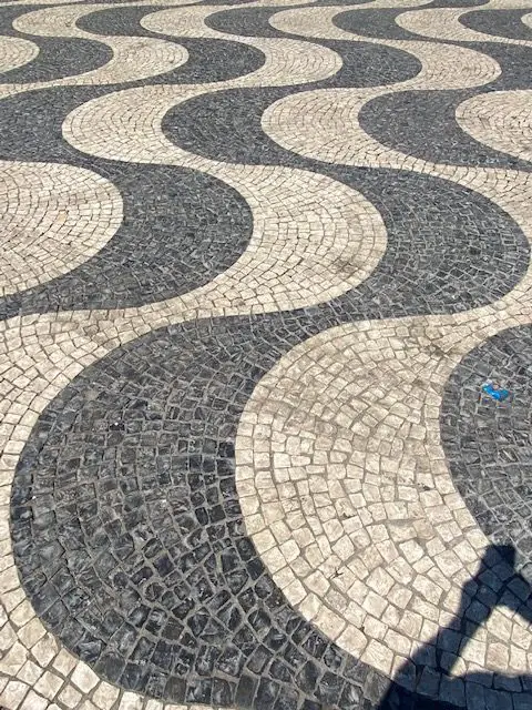 Undulating black and white tiles (Calçcada Portuguesa) that mimic waves were laid in Lisbon's Rossio Square (PraçaDom Pedro IV) in the 19th century.