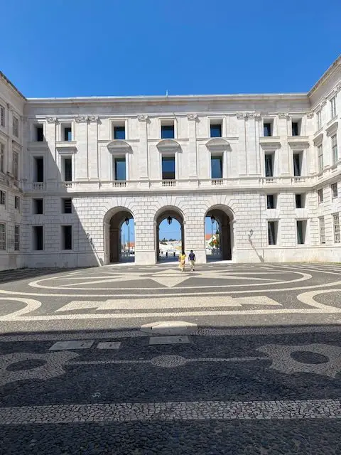 Courtyard of the Ajuda National Palace in Lisbon.  The entrance to the Royal Treasure Museum is across the courtyard and  through the arches
