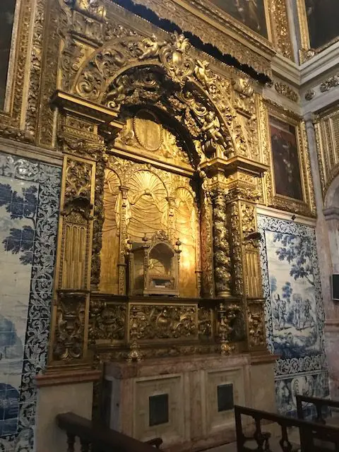 The Baroque Chapel of St. Anthony inside Lisbon's National Tile Museum features lots of gold, blue and white azulejo tile, and Brasil wood