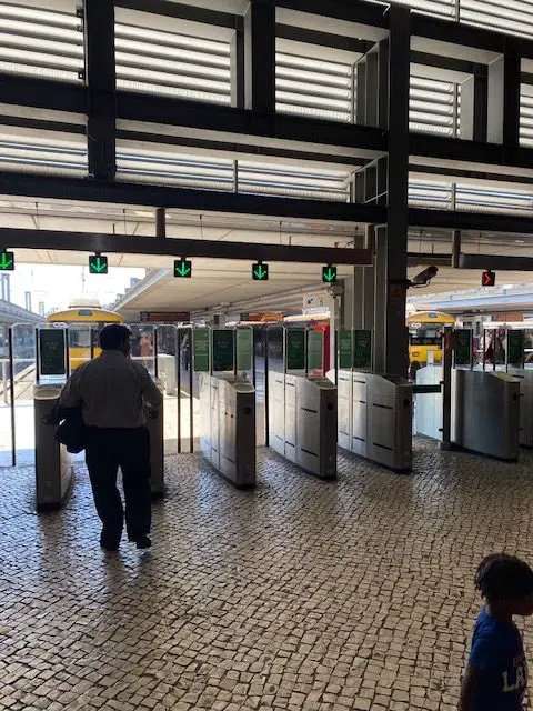 Turnstiles for trains going west from Lisbon's Cais do Sodré train station
