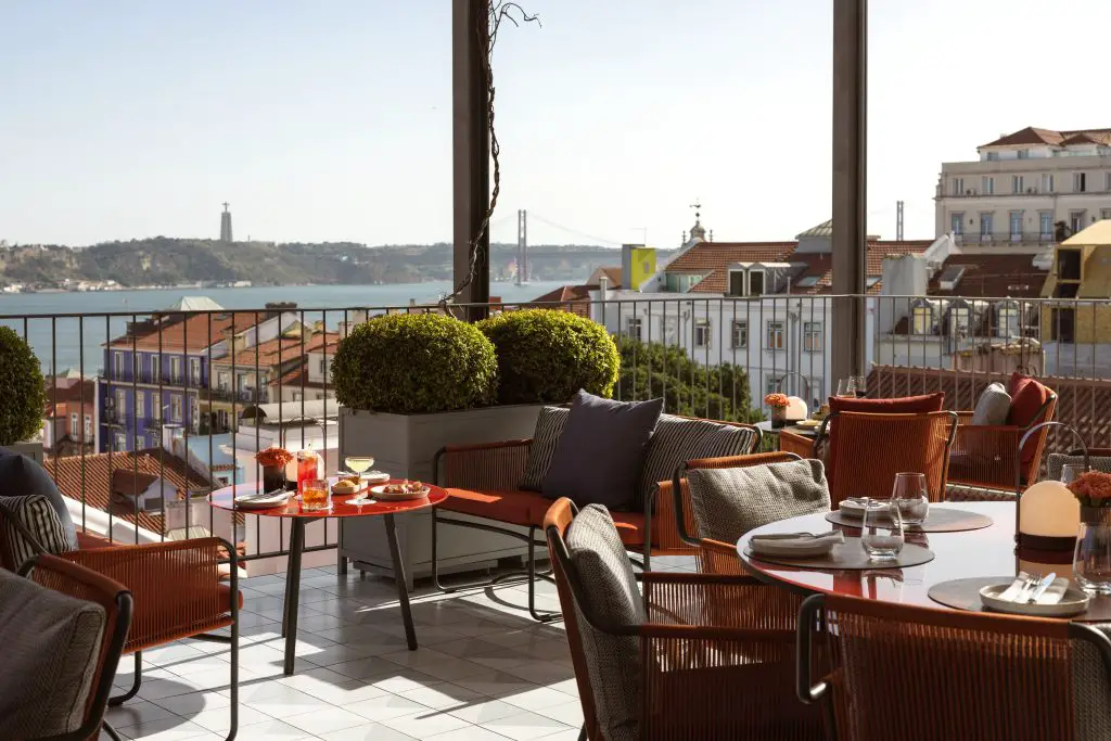 A view of the 25 of April Bridge and the Tejo River from BAHR & Terrace in Lisbon, Portugal