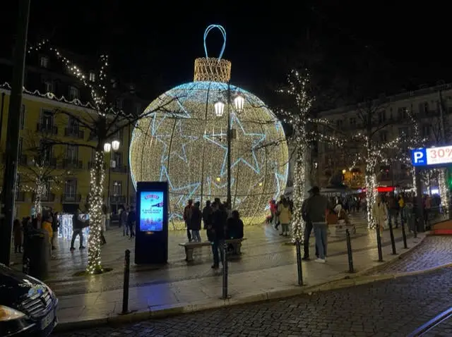 A large, lighted Christmas ornament in Lisbon Portugal