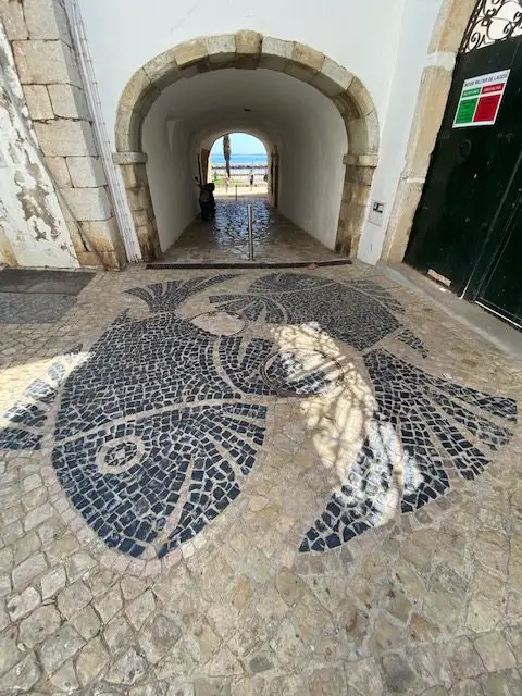 This large black and white cobblestone fish mosaic is found in Lagos, Portugal