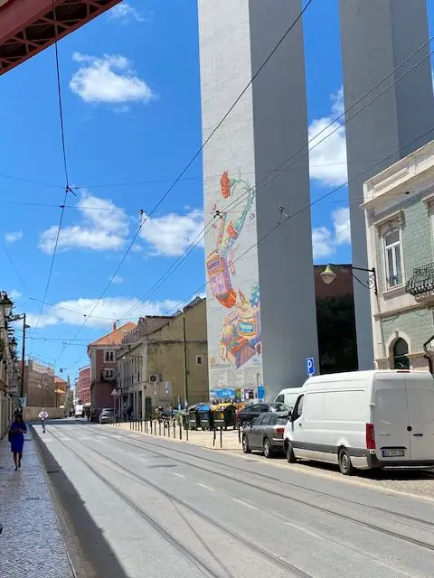 This mural is on one of the columns supporting the 25 of April Bridge in Lisbon's Alcântara neighborhood