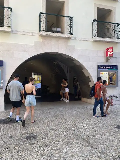 Entrance to Lisbon's Baixa-Chiado Metro Station on Rua do Crucifixo in the Baixa neighborhood.