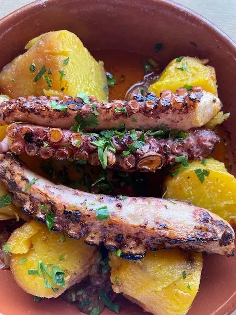 Grilled octopus and sweet potatoes at the unique Lisbon eatery - Chaptio a Mesa.