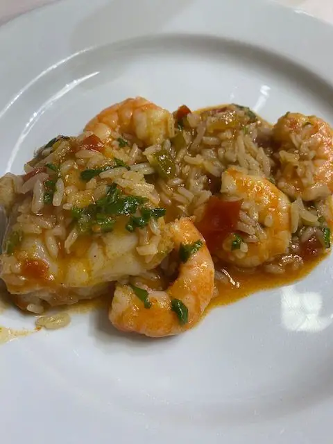 One portion of monkfish and shrimp with rice at Lisbon restaurant Casa do Alentejo