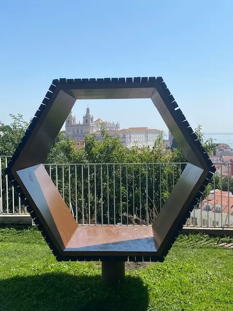 This hexagonal sculpture frames the view at the Miradouro do Recolhimento viewpoint in Lisbon, Portugal