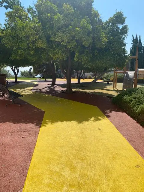 This yellow walkway in Lisbon's Parque do Recolhimento leads to one of Lisbon's best scenic viewpoints