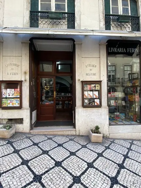 The exterior of the 150 year-old Livraria Ferin in Lisbon's Chiado neighborhood