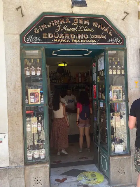 The facade of Lisbon's Ginjinha Sem Rival at Rua das Portas de Santo Antão, 7, is one of the oldest Ginjinha bars in Lisbon