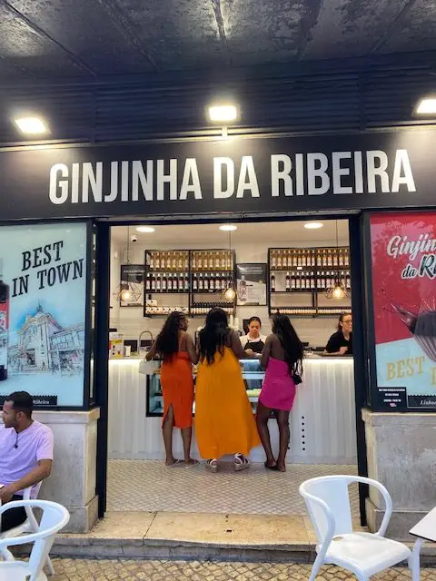 Ginjinha da Ribeira sells shots of ginjinha in chocolate cups at Lisbon's Time Out Market.