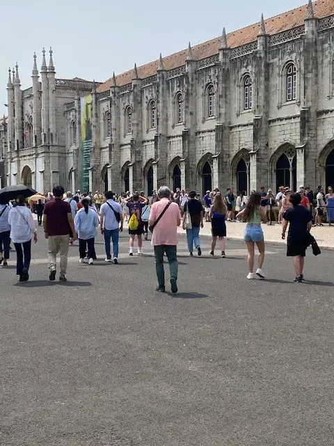 Crowds waiting to enter the Jerónimos Monastery in Lisbon, Portugal