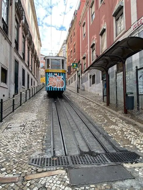 Lisbon's Elevador da Glória funicular carries passengers up and down the Calçada da Glória between Restuaradores Square and Bairro Alto