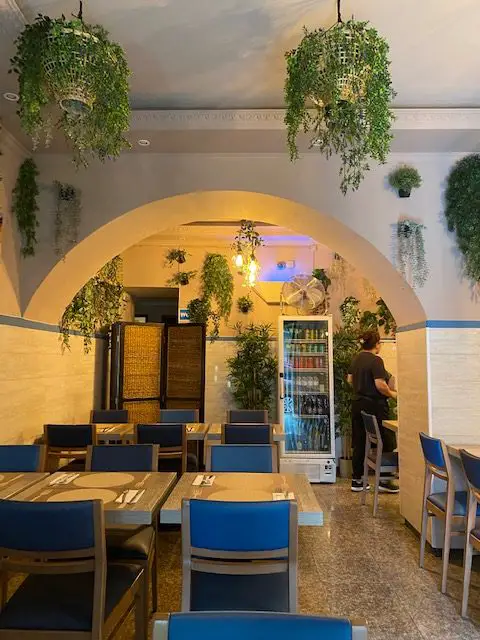 The plant-filled interior at Lisbon's vegan buffet Jardim das Cerejas