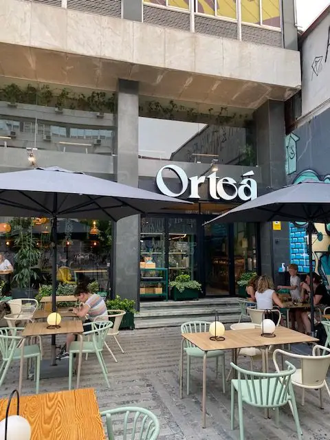The facade and terrace at Lisbon vegan restaurant Orteá