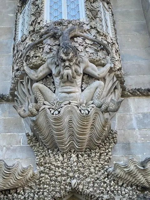 The Triton guards the Coral Gate at Sintra's Pena Palace.  You can visit Pena Palace on a day trip or overnight trip from Lisbon.